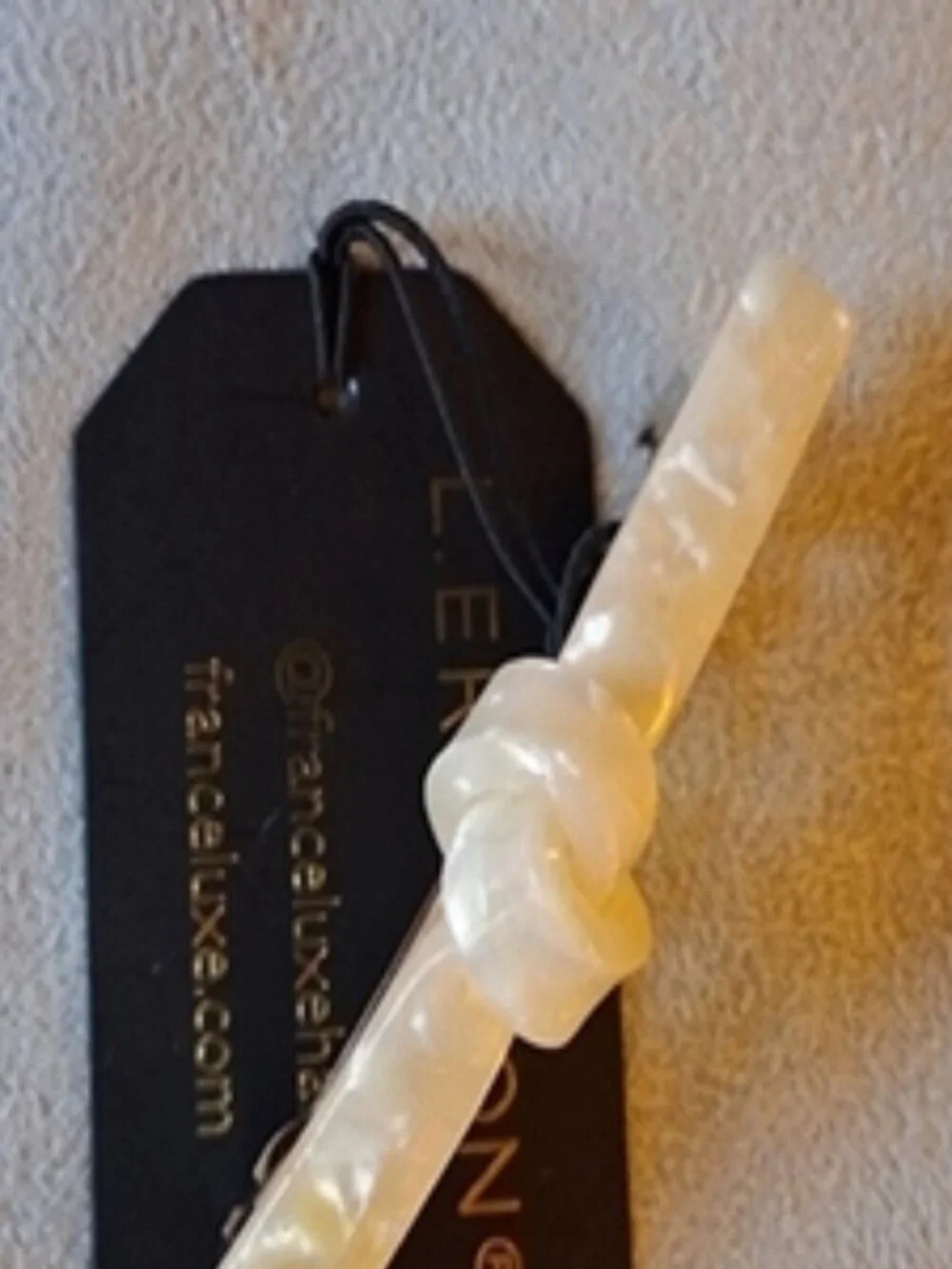 France Luxe L. Erickson Cream Acetate Knot Barrette
